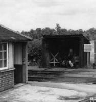 022 Wickham Trolley Shed 1964
1) that alternative paraphernalia has been stored in the Wickham Shed.
2) the run down state of the Porter’s Lodge hut.
3) glazed window on the Porter’s Lodge hut.
4) the broken, part-demolished ramp rear wall.
